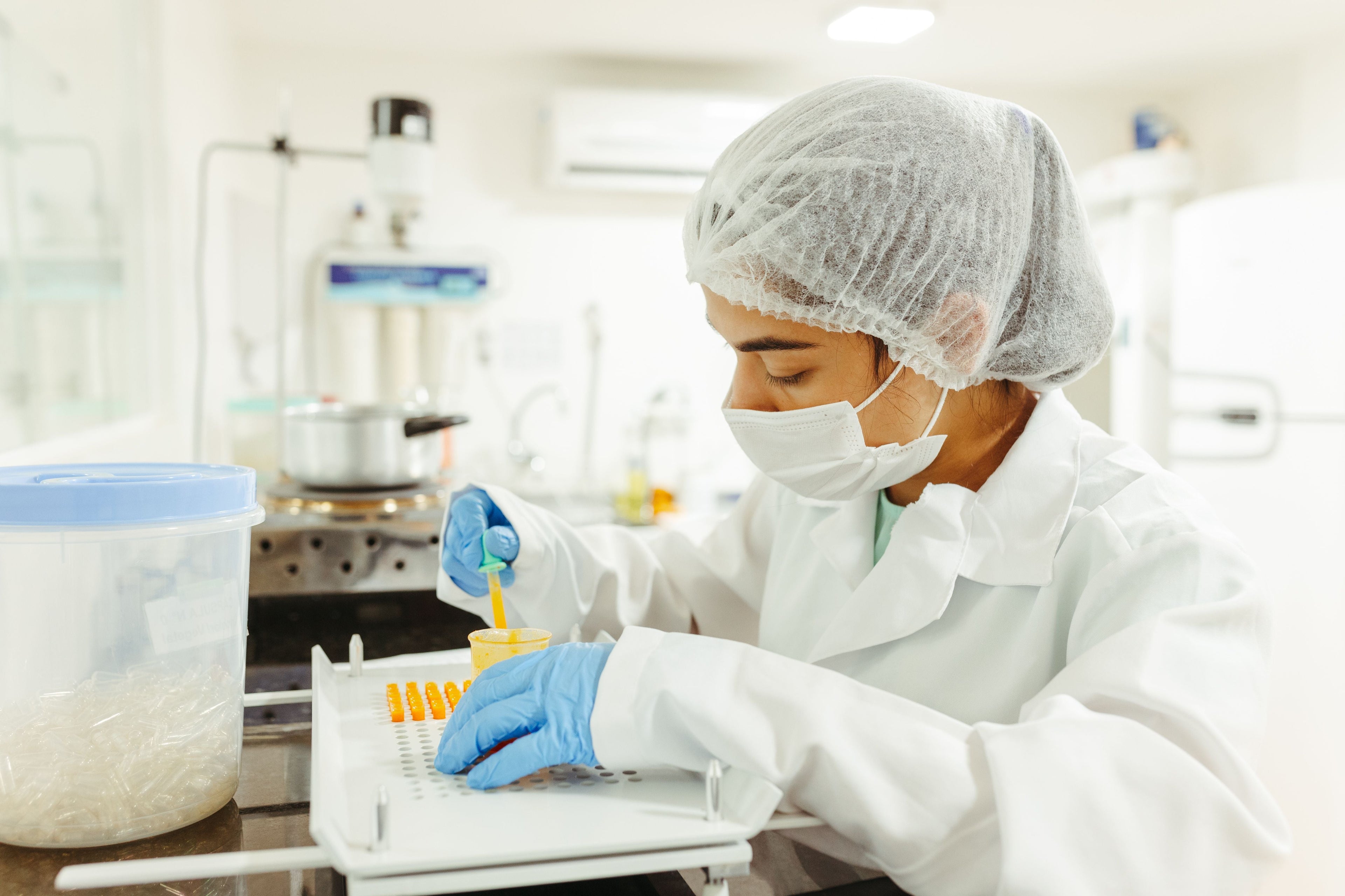 Person working in a laboratory environment.